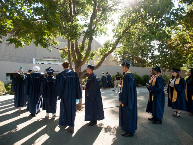 Students from Biological Sciences lined up outside of commencement ceremony